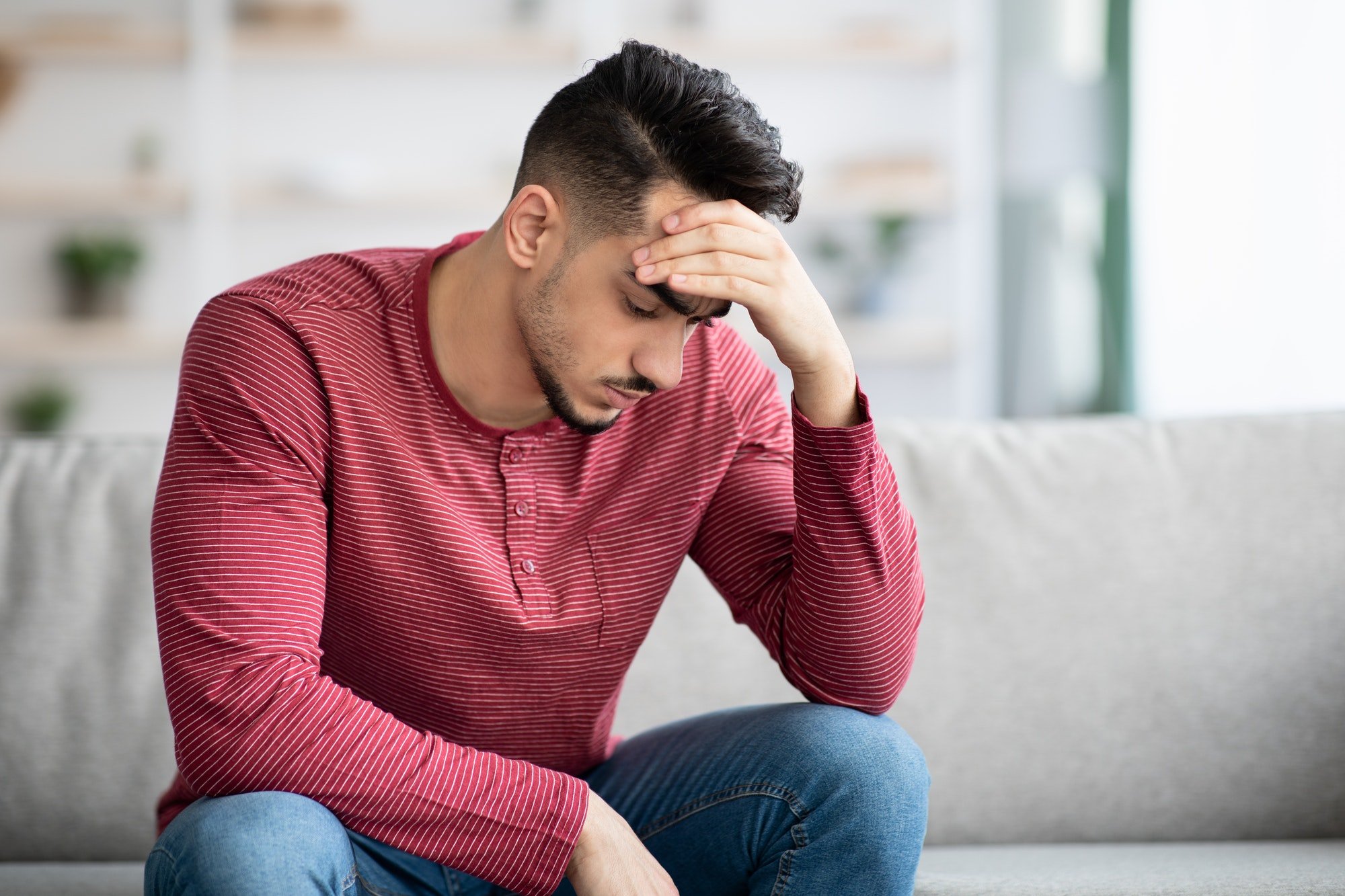 Closeup portrait of pensive arab guy having difficulties